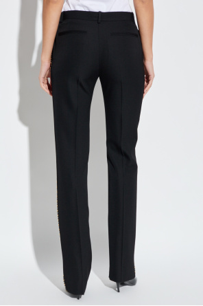 Versace Creased trousers with studs