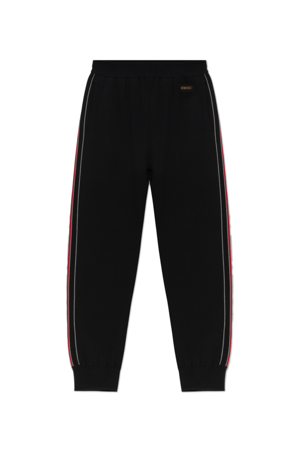 Cotton trousers with ribbed cuffs od Versace