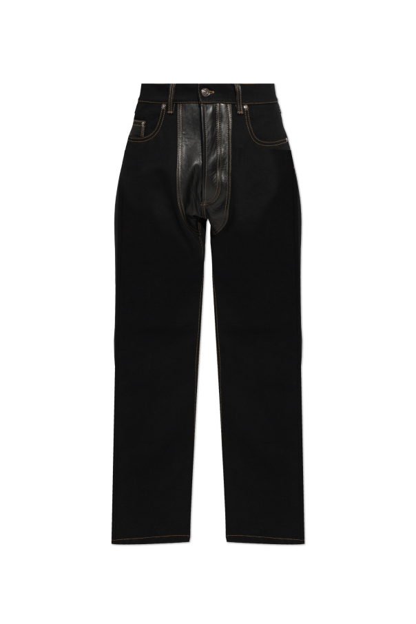 Jeans with leather inserts od Versace