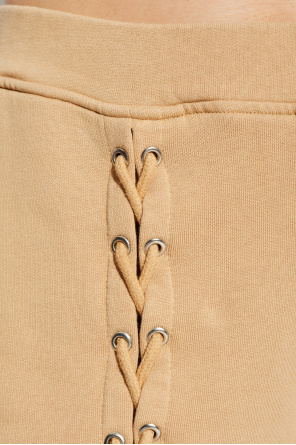 ROTATE Spodnie dresowe przeplatane trokami