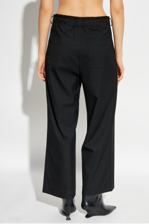 add Pantalones con logo