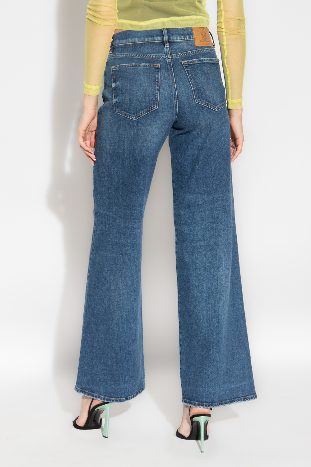Kimberly C Full Size Wide Waistband Slit Flare Pants – Blue
