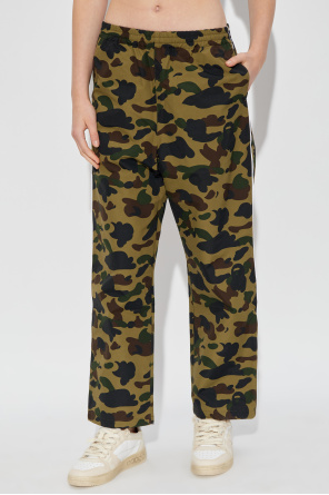 A BATHING APE® Trousers with a camo motif