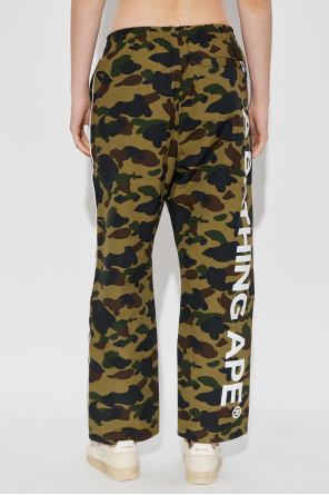 A BATHING APE® Trousers with a camo motif