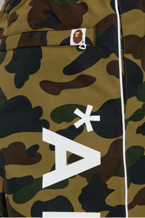 A BATHING APE® Trousers with a camo motif
