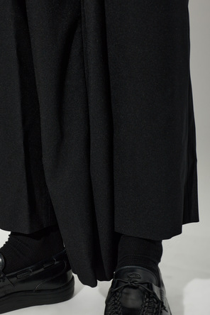 Comme des Garçons Black Spodnie o asymetrycznym kroju