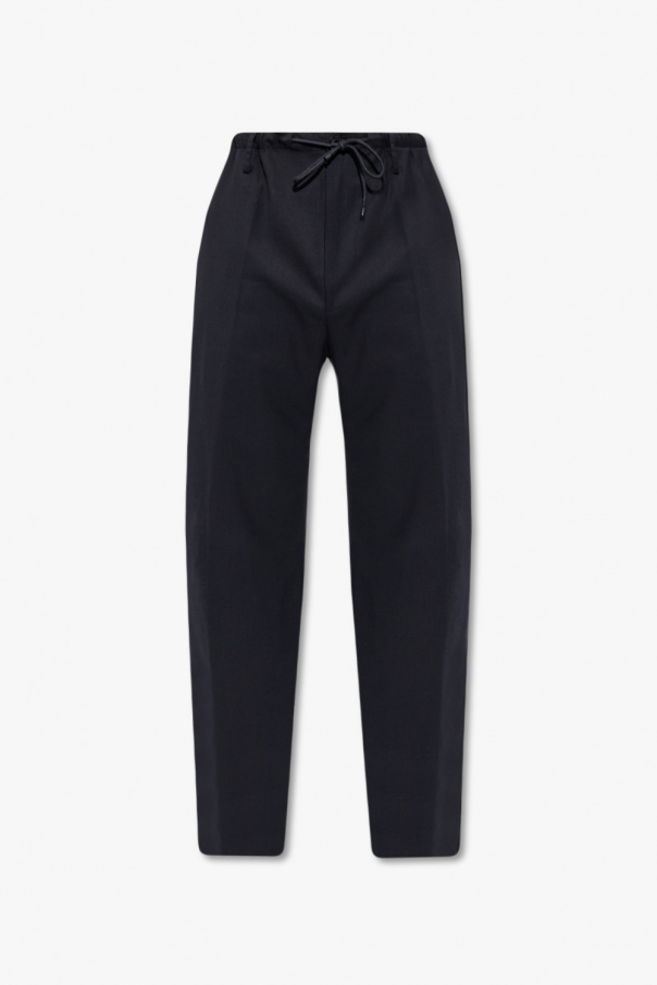 they dress slightly small Pleat-front Longline trousers