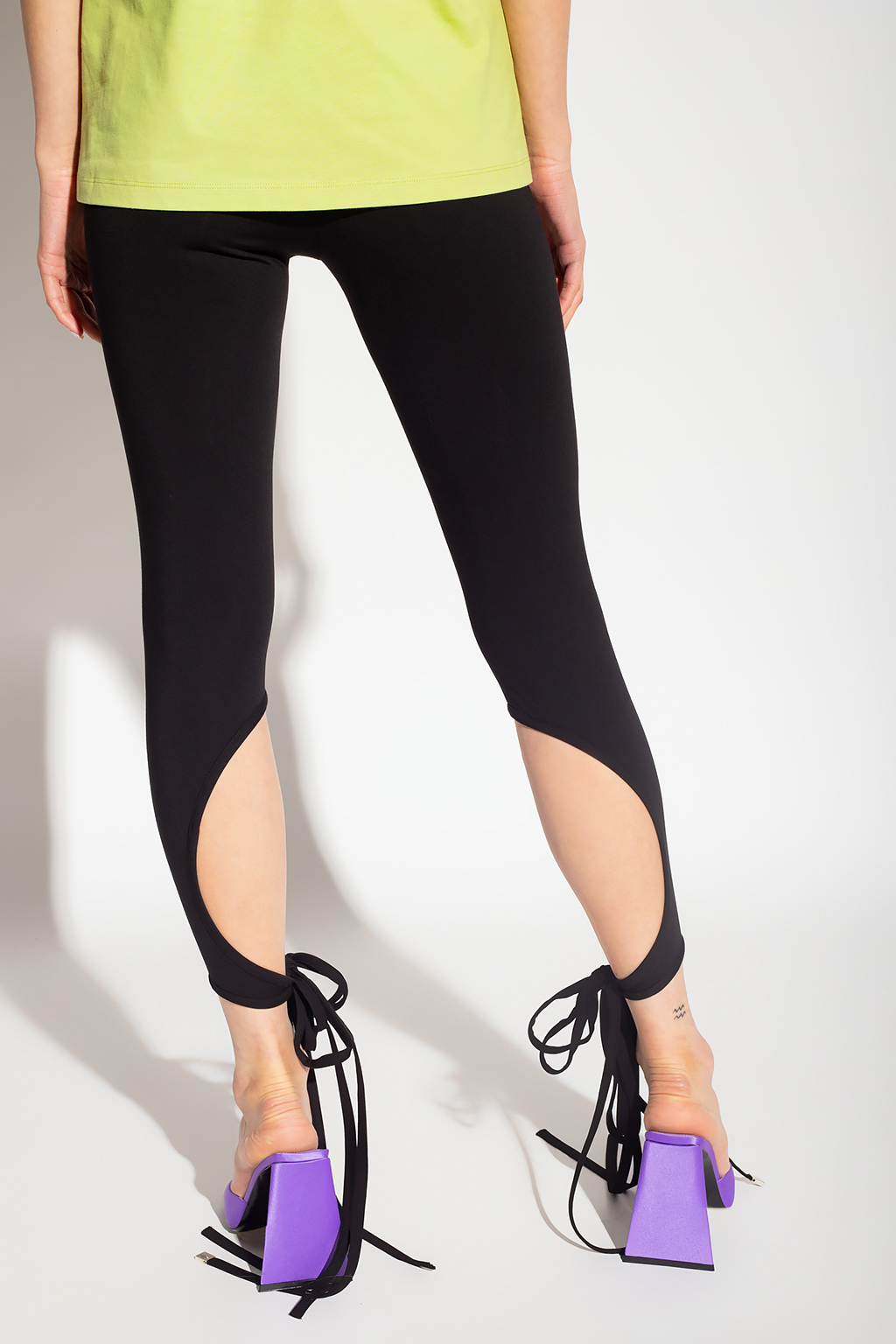 The Attico ‘Davie’ leggings with decorative drawstrings