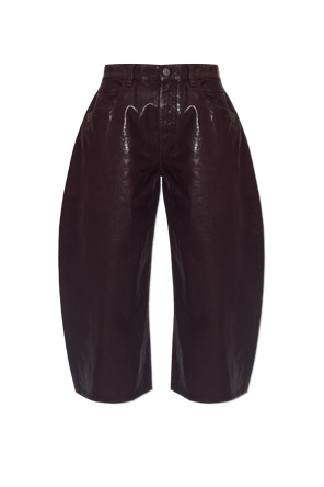 Trousers with a shimmering finish