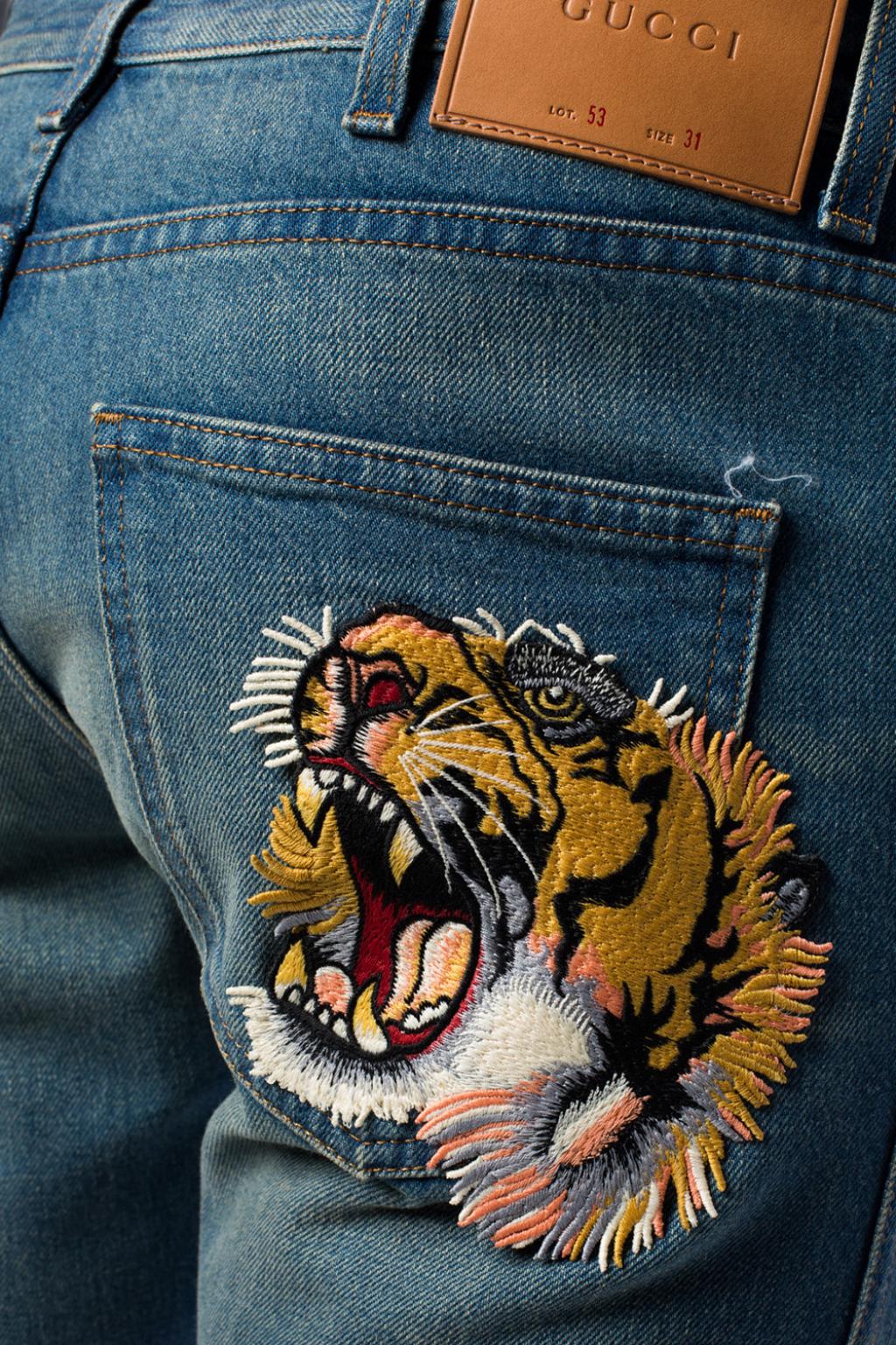 Embroidered tiger head jeans Gucci 