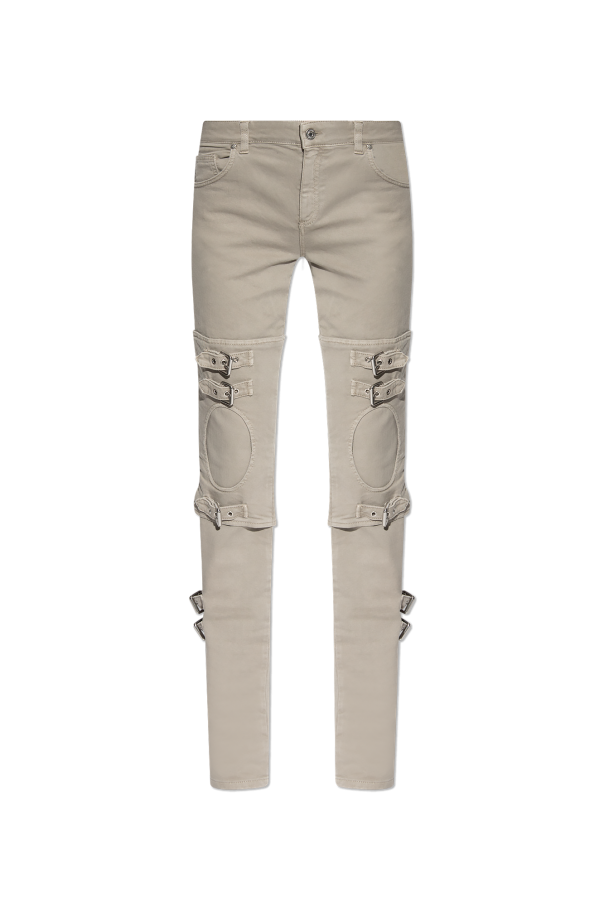 Flared jeans with buckles od Blumarine