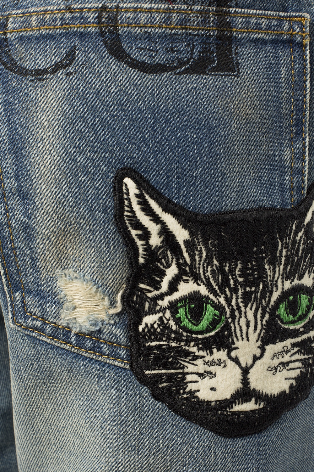 gucci cat jeans