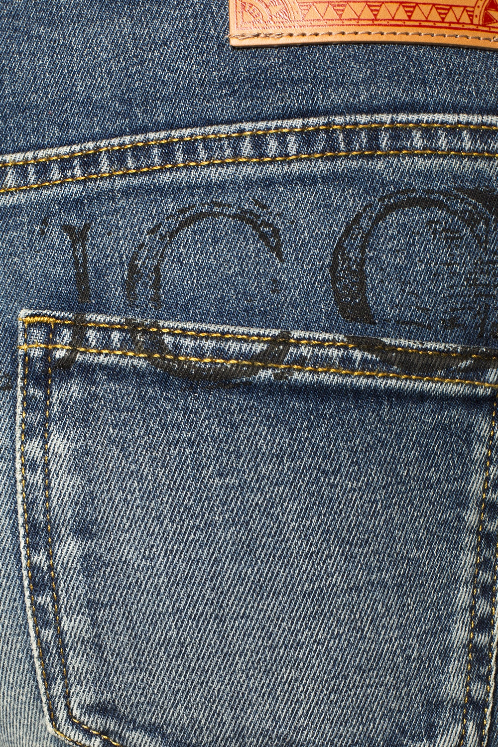 gucci jeans logo