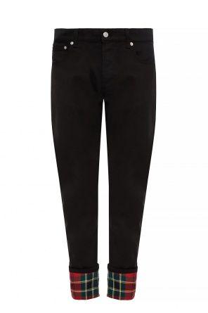 Jeansy z wyszytym wzorem w kratę od Alexander McQueen