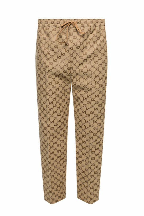 Gucci Logo-patterned pleat-front trousers