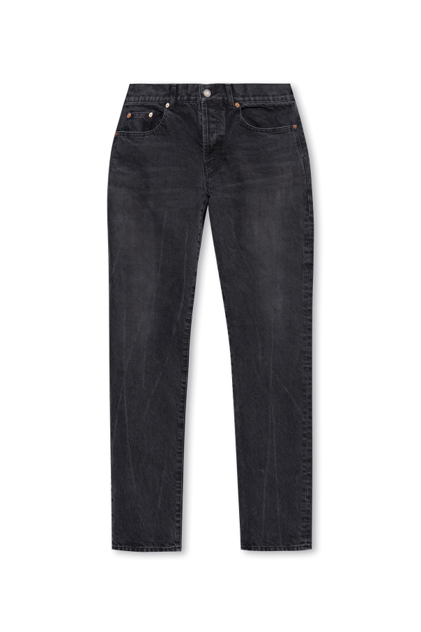 Jeans with logo patch od Saint Laurent