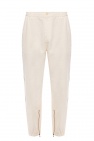 Adopt a unique approach to dressing with the ivory Levi pants from 's SS20 collection