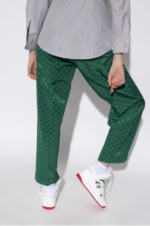 Gucci Monogrammed toile trousers