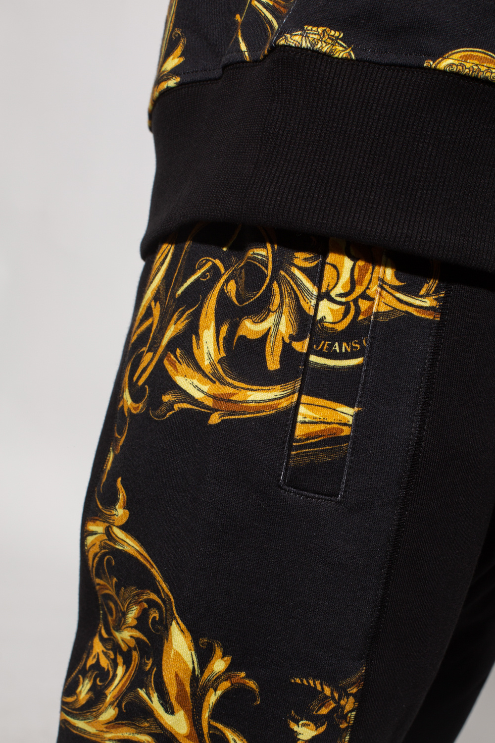 Balmain logo tape slim jeans Sweatpants with Baroque motif