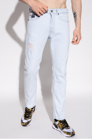 split-cuff acid-effect jeans Jeans with logo