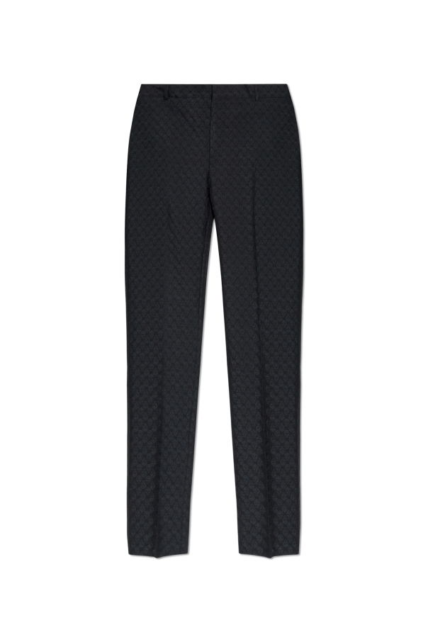 Trousers with a distinctive skull motif od Alexander McQueen