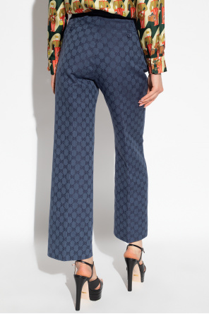 Gucci Monogrammed pleat-front trousers
