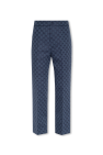 Gucci Monogrammed pleat-front trousers