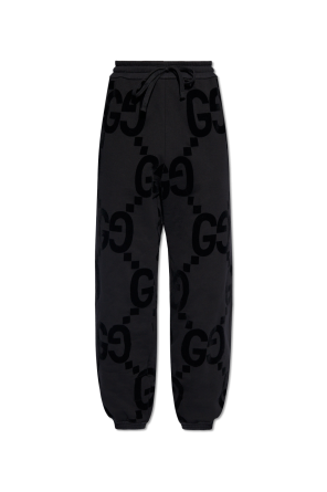 Monogrammed sweatpants od Kardashians Gucci