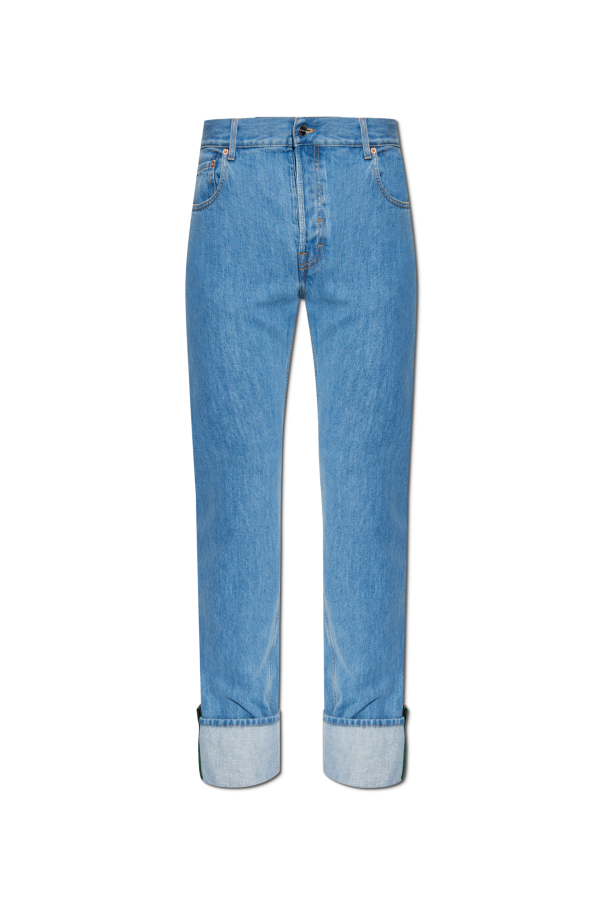 Jeans with rolled-up legs od Gucci