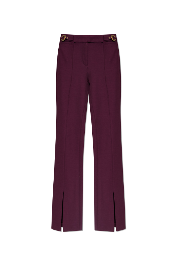 Flared trousers with a slit od Versace Jeans Couture