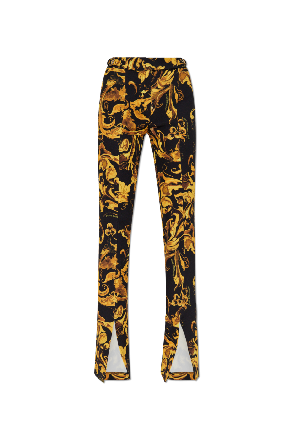 Flared trousers with slit od Versace Jeans Couture