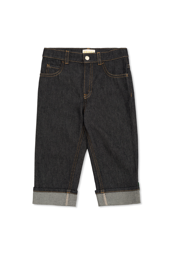 Jeans with rolled-up cuffs od Gucci Kids
