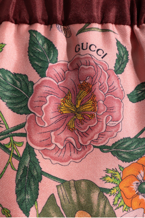 Gucci Pantalones de seda con estampado floral