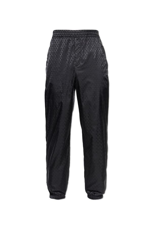 Trousers with sewn-in zippers in the legs od Alexander McQueen