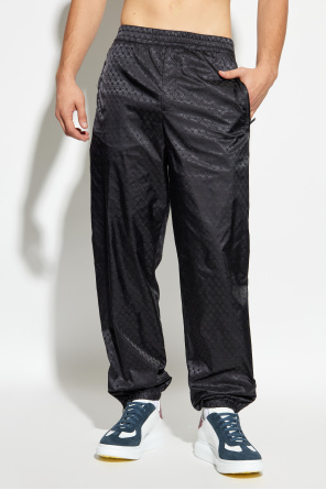 Alexander McQueen Trousers with sewn-in zippers in the legs