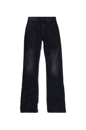 Jeansy z efektem `vintage`