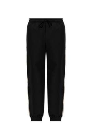 Trousers with side stripes