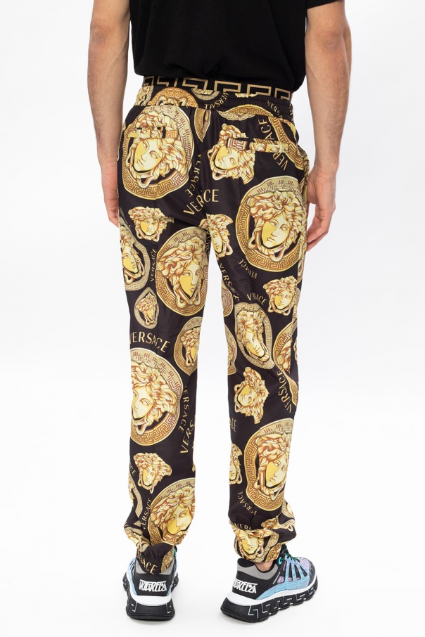 Casual black trousers for men with Logo Couture pattern  VERSACE JEANS  COUTURE  Pavidas