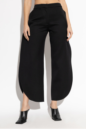 Alaïa Wełniane spodnie z rozcięciem na nogawkach