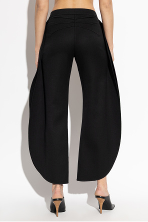 Alaïa Wełniane spodnie z rozcięciem na nogawkach