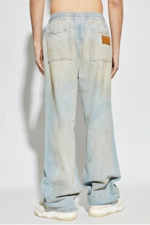 Amiri Vaqueros con logo