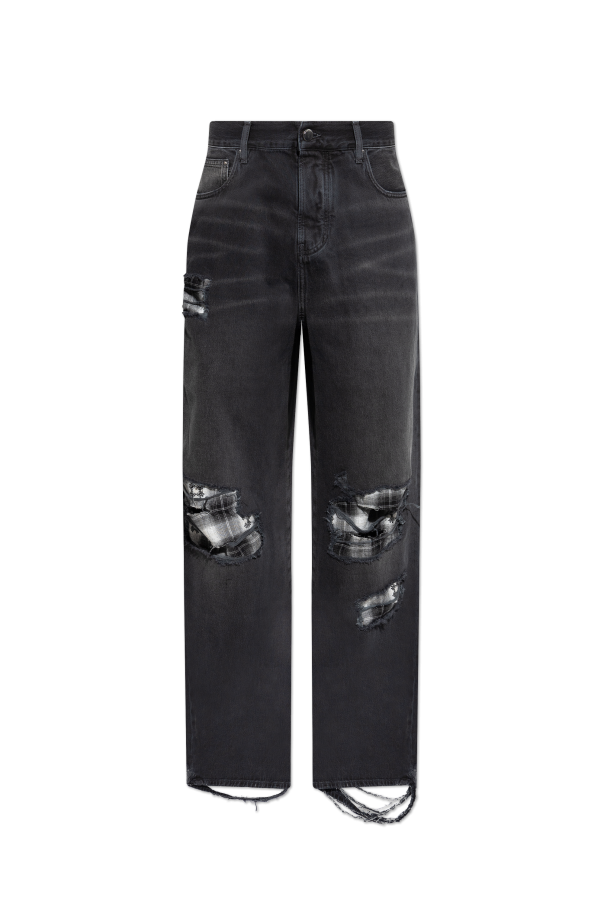 Jeans with distressed details od Amiri