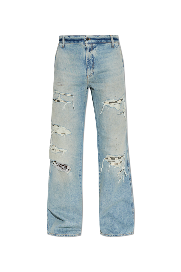 Jeans with abrasions od Amiri