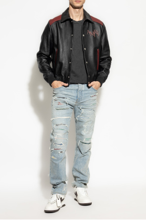 Jeans with distressed effect od Amiri