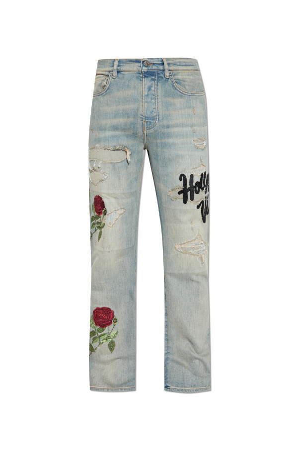 Jeans with shimmering appliqués od Amiri