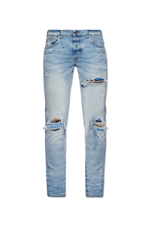 Jeans with destroyed effect od Amiri