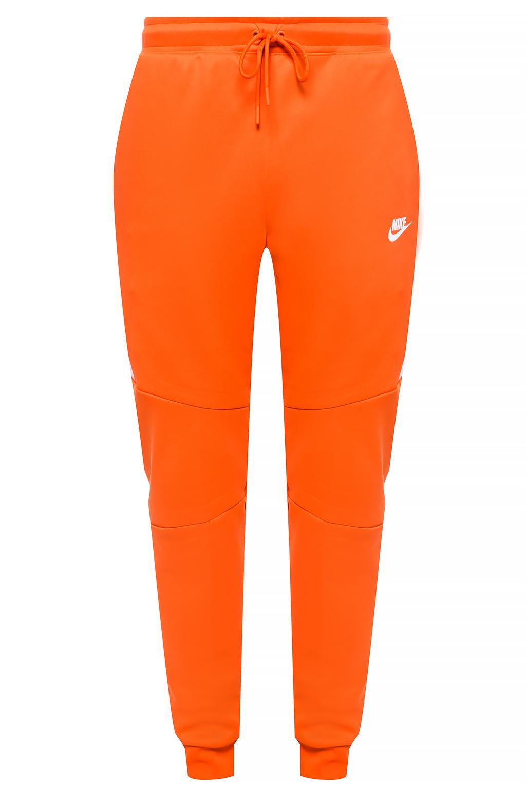 orange nike pants