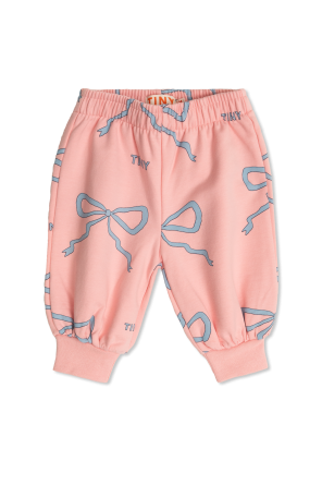 Pants with bow motif