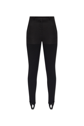 Trousers with elastic foot strap