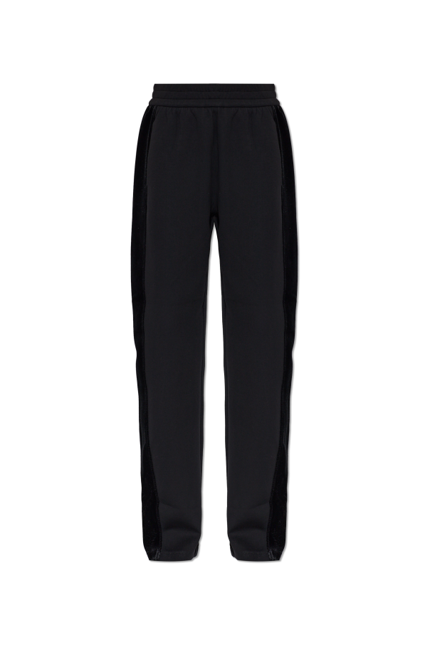 Trousers with side stripes and a velvet finish od Emporio Armani